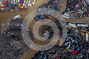 Scrapyard Aerial View. Old rusty corroded cars in car junkyard. Car recycling industry from above