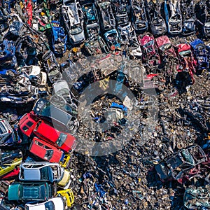 Scrapyard Aerial View. Old rusty corroded cars in car junkyard. Car recycling industry from above