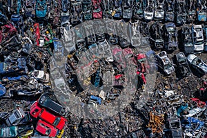 Scrapyard Aerial View. Old rusty corroded cars in car junkyard. Car recycling industry from above