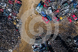 Scrapyard Aerial View. Old rusty corroded cars in car junkyard. Car recycling industry from above