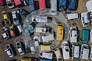 Scrapyard Aerial View. Old rusty corroded cars in car junkyard. Car recycling industry from above