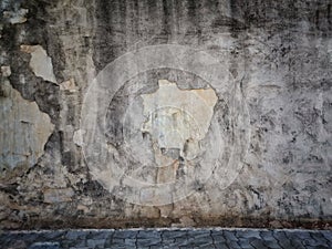 Scratch and cracked old concrete wall for abstract background and texture.