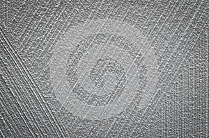Scratched curved on concrete wall texture background.