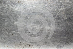 Scratched metal bright texture background