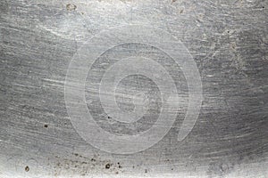 Scratched metal bright texture background photo
