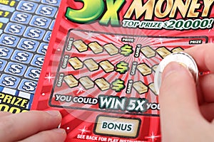 Scratching lottery ticket