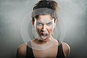 Scream of angry upset woman photo