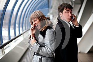 Scream - man and girl with cellular phones