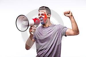 Scream on megaphone Slovak football fan in game supporting of Slovakia national team