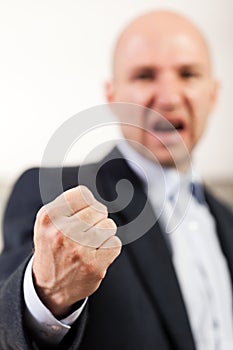 Screaming angry men fist