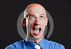 Screaming bald man