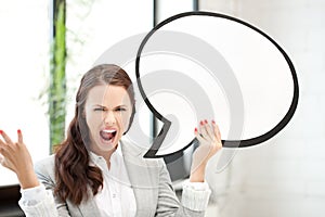 Screaming businesswoman with blank text bubble