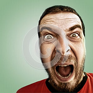 Screaming face of shocked funny man