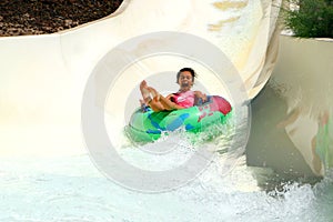 Screaming girl down the slide