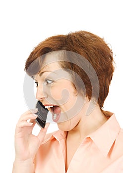 Screaming girl with mobile phone isolated