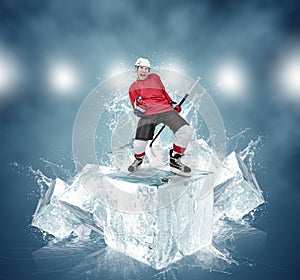 Screaming hockey player on abstract ice cubes background