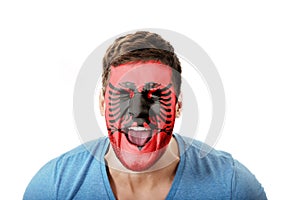 Screaming man with Albania flag on face.