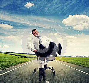 Screaming man on the chair and small man