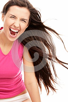 Screaming woman with blowing hair