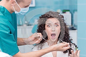 Screaming woman at dentist appointment