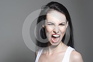 Screaming woman. Emotional portrait. Face expression. Human emotions. Shout. Isolated.