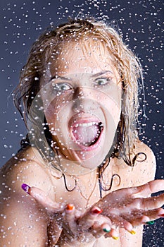 Screaming woman with falling water droplets