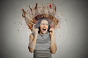 Screaming young woman with headset