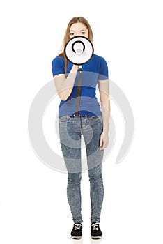 Screaming young woman with megaphone.