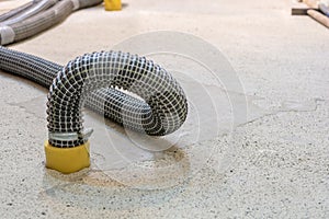 Building drying with suction with air suction hoses in damp soil photo