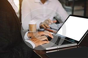 Screen computer mockup for advertising text, Male hand using laptop texting contact business search information on desk in