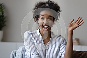 Screen view of smiling biracial woman talk on video call