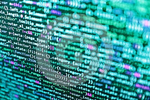 Screen of web developing php code on dark background. Binary code digital technology background. Coding programmer abstract