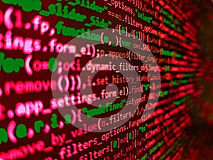Screen of web developing php code on dark background. Software developer programming code. Computer script coding source code on