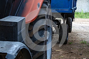 Screw handlers for harvesting of rape in field near the town