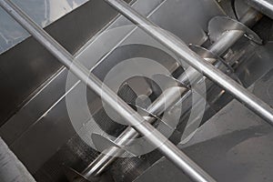 Screw loader for grape feeding