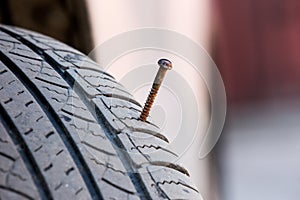 puncturing tire close up