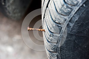 puncturing tire close up