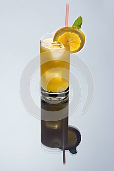 Screwdriver cocktail on a grey background