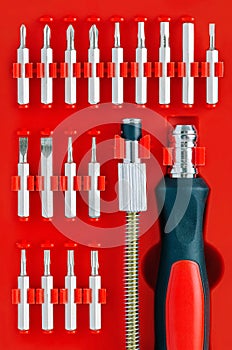 Screwdriver Kit on Red Background