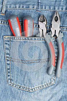 Screwdriver, nippers and pliers in the pocket