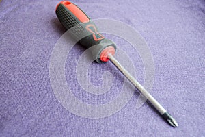 Screwdriver with rubberized red-black handle