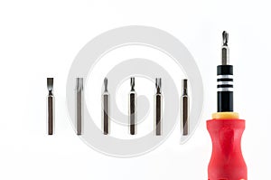 A screwdriver with a set of changable nozzels isolate on white b