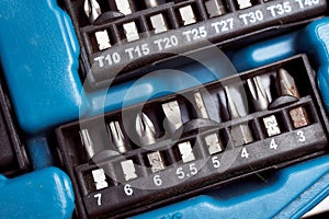 Screwdriver set tips in a plastic case. Top view