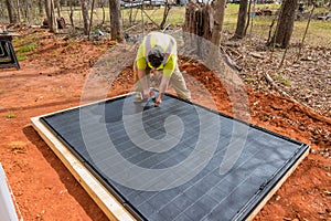 Screwing plastic base platform is an important step in assembling the plastic vinyl storage shed