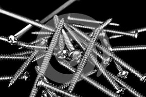 Screws on Black background