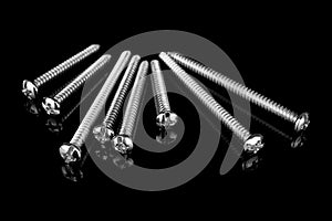 Screws on Black background