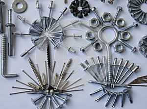 Screws, bolts, nails, dowels, rivets, nuts,