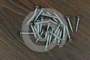 Screws on a wooden panel