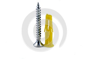 Screws and yellow plastic anchor