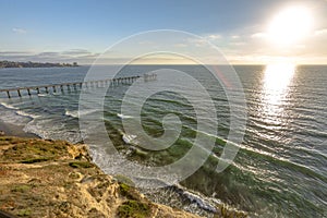 Scripps pier sunset with lens flare
